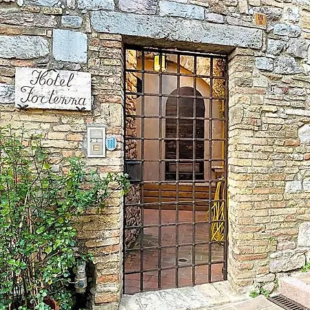 מלון La Fortezza אסיסי